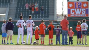 Kids lined up with middle infielders Tyler Krieger and Steve Wilkerson during the National Anthem prior to the game.