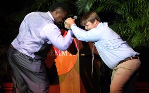 Grady Jarrett and Cody Proveaux present the award for Competition of the Year