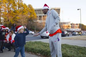 Men's and women's players treated local children to an unforgettable Christmas on Dec. 11 at Tiger Wonderland.