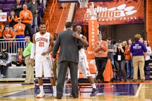 Head coach Brad Brownell and seniors Damarcus Harrison, Rod Hall