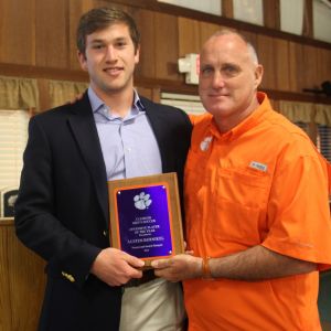 Austen Burnikel is presented the Offensive Player of the Year Award