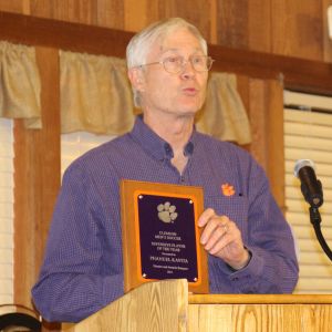David Schmieding accepts the Defensive Player of the Year Award on behalf of Phanuel Kavita