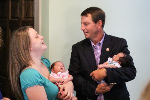 Dabo Swinney with a transitional house resident.