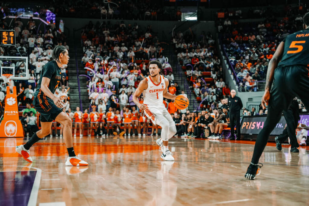 Late, Dominant Surge Launches Tigers Past Hurricanes 77-60